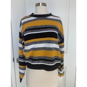 Sweater with horizontal print lines.